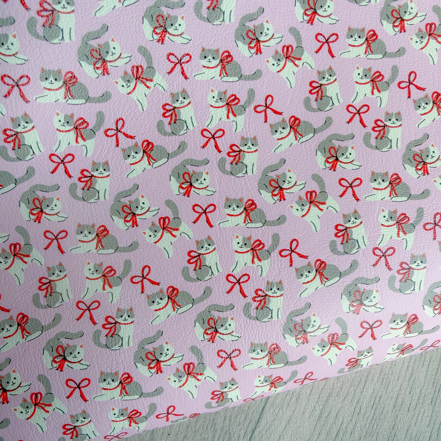 Red Bow Kitty’s Faux Leather Sheet